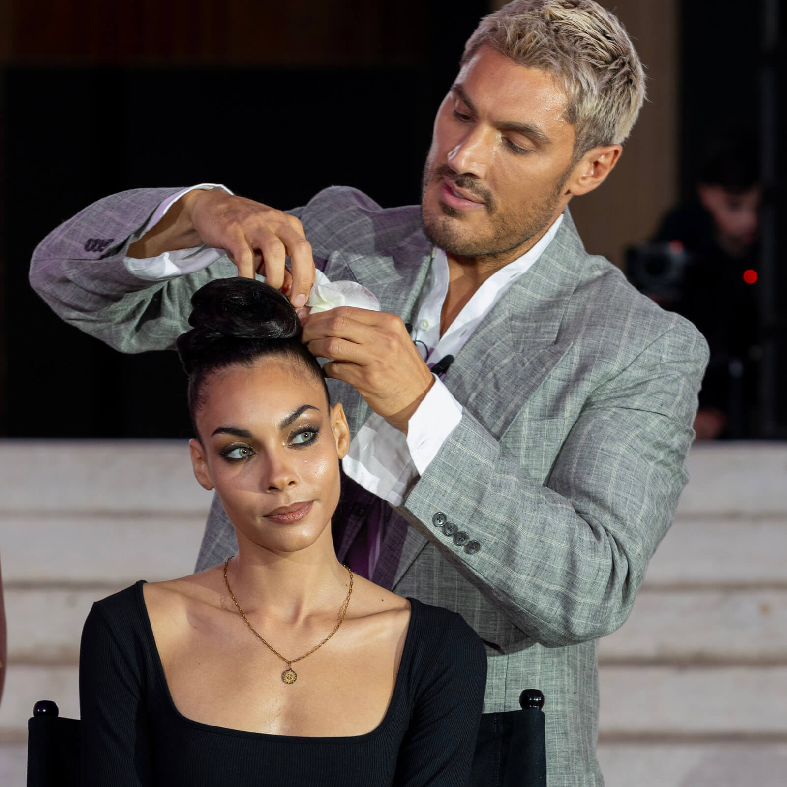 Chris Appleton styling up do at Paris Fashion Week